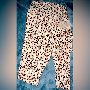 NWT Cream, Orange & Black Animal Print Woman’s Leggings